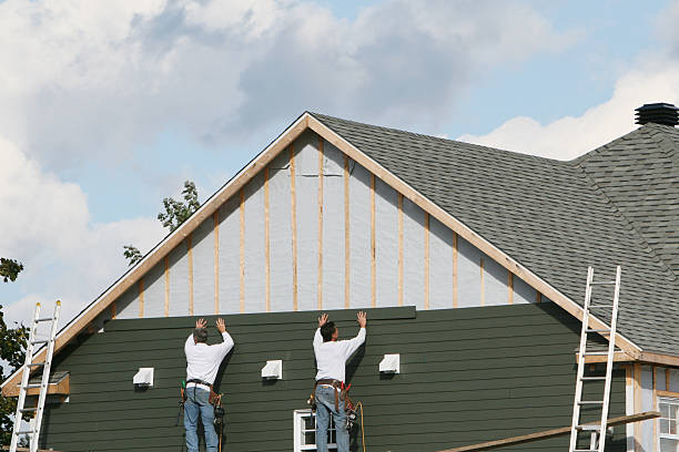 Professional Siding Replacement technician working in Brielle, NJ